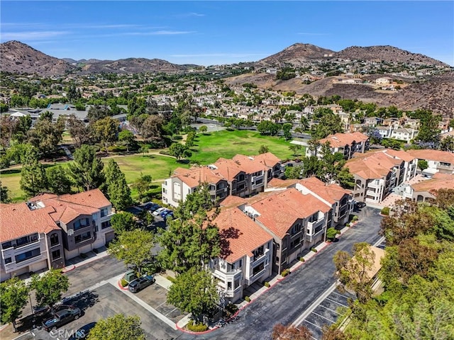 1980 Las Colinas Cir Unit 301, Corona, CA 92879 - aerial overview of property's location with a mountainous background and nearby suburban area