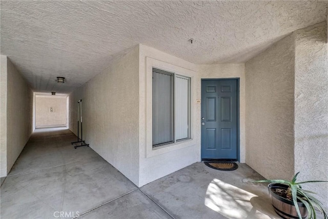 1980 Las Colinas Cir Unit 301, Corona, CA 92879 - view of exterior entry featuring stucco siding