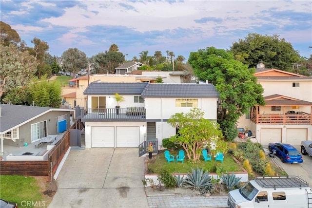 34582 Calle Rosita, Dana Point, CA 92624 - view of front of property with an attached garage, concrete driveway, stucco siding, and a tiled roof
