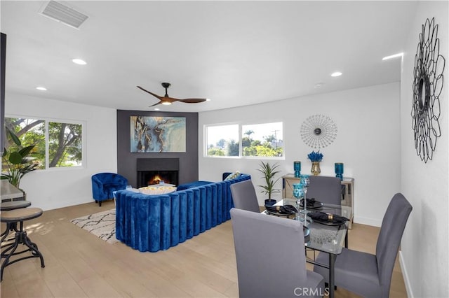 34582 Calle Rosita, Dana Point, CA 92624 - living room featuring a ceiling fan, a lit fireplace, recessed lighting, wood finished floors, and baseboards