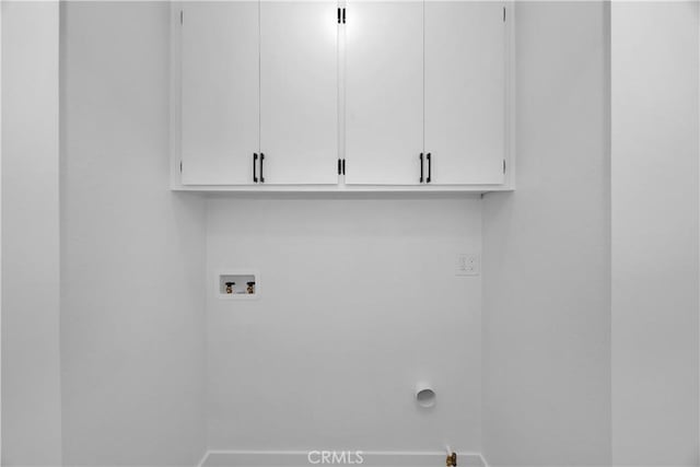 34582 Calle Rosita, Dana Point, CA 92624 - washroom featuring cabinet space, hookup for a washing machine, and baseboards