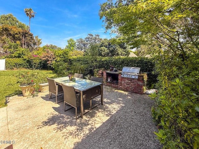 1908 Warwick Rd, San Marino, CA 91108 - view of yard featuring an outdoor kitchen, outdoor dining space, a patio area, and fence