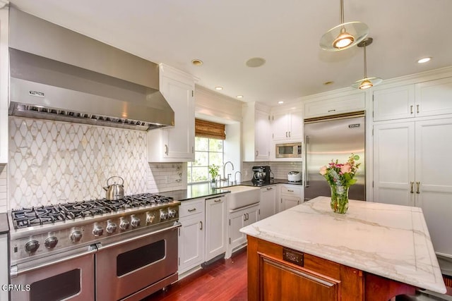 1908 Warwick Rd, San Marino, CA 91108 - kitchen with built in appliances, a sink, dark wood-style floors, white cabinetry, and recessed lighting