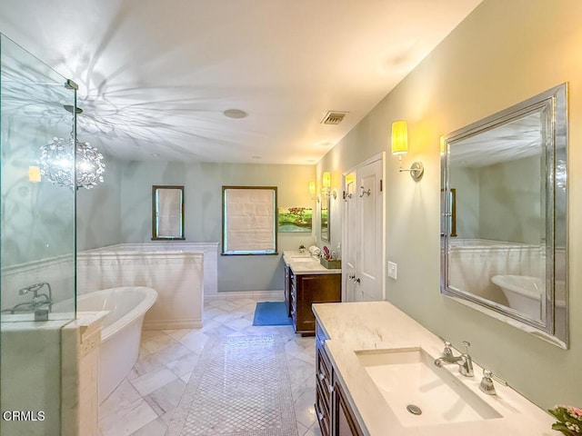 1908 Warwick Rd, San Marino, CA 91108 - full bath featuring a freestanding bath, two vanities, and marble finish floors