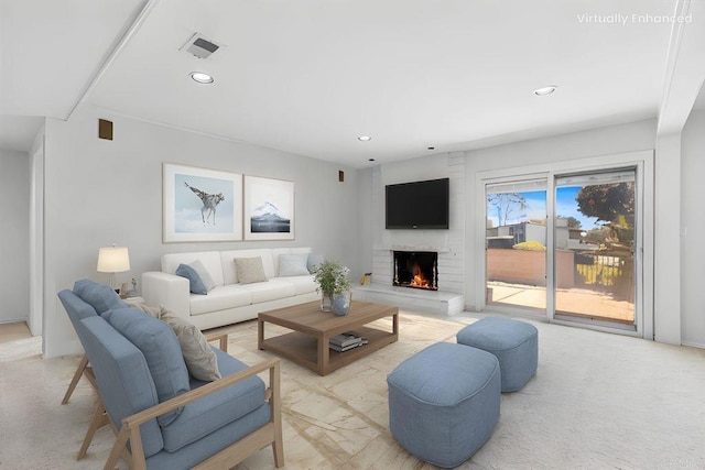 2117 Vista Entrada, Newport Beach, CA 92660 - living room with a fireplace, recessed lighting, and light carpet