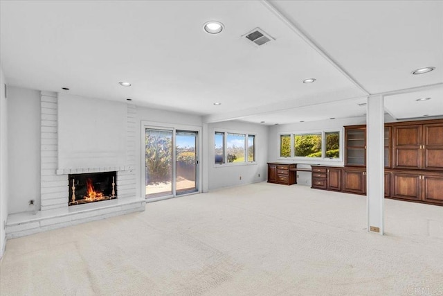 2117 Vista Entrada, Newport Beach, CA 92660 - unfurnished living room with recessed lighting, carpet flooring, and a fireplace