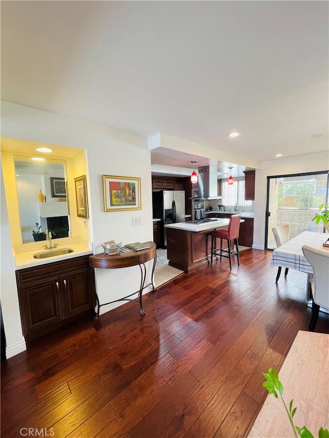 227 E Burbank Blvd Unit E, Burbank, CA 91502 - living area featuring dark wood-style flooring and recessed lighting