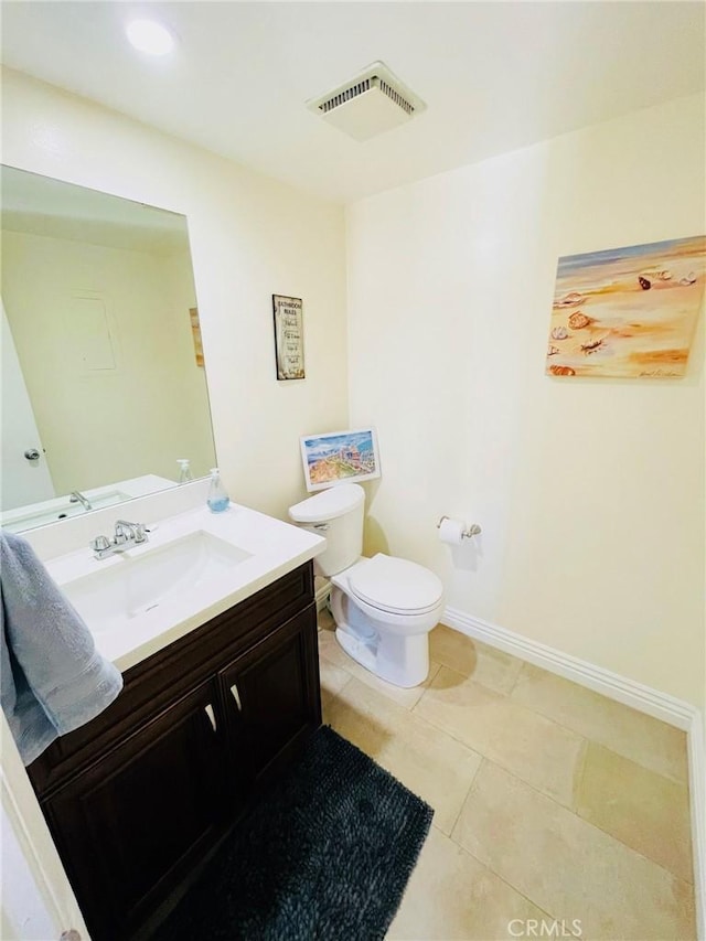 227 E Burbank Blvd Unit E, Burbank, CA 91502 - bathroom with toilet, tile patterned floors, vanity, and baseboards