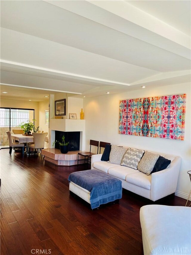 227 E Burbank Blvd Unit E, Burbank, CA 91502 - living room featuring wood-type flooring and a fireplace with raised hearth
