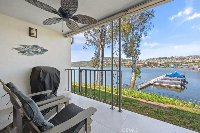 22244 Treasure Island Dr Unit 5, Canyon Lake, CA 92587 - view of patio / terrace with a water view, a ceiling fan, a grill, and a floating dock