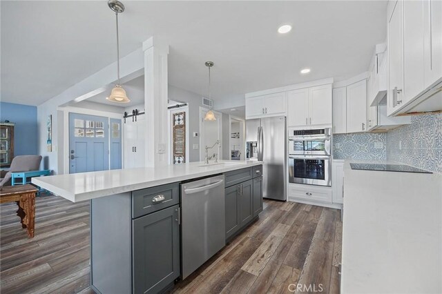 22244 Treasure Island Dr Unit 5, Canyon Lake, CA 92587 - kitchen featuring stainless steel appliances, gray cabinetry, white cabinetry, light countertops, and recessed lighting
