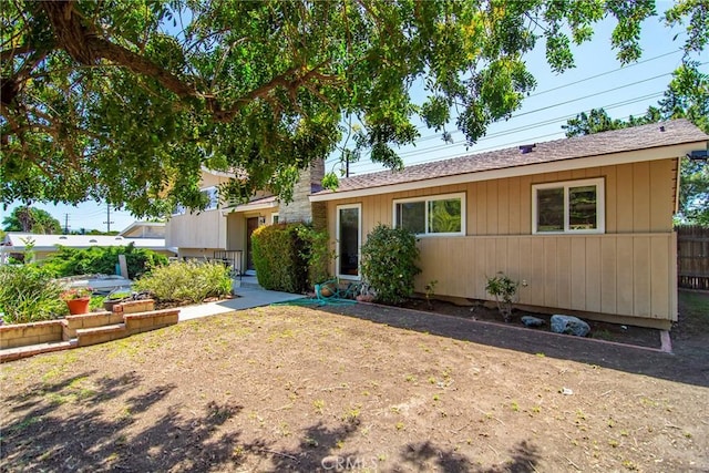 view of front of home with fence