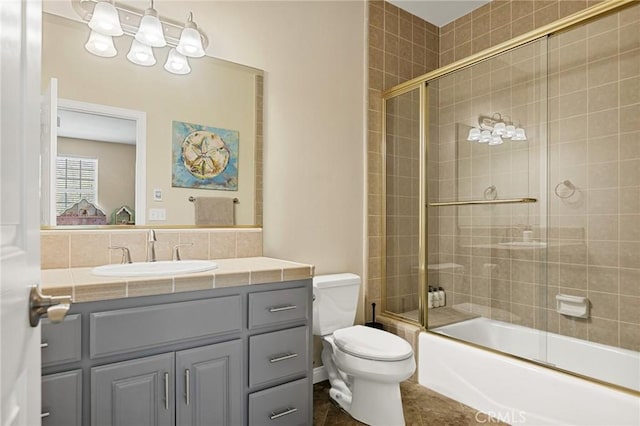 28537 N Shore Rd, Lake Arrowhead, CA 92352 - full bath with vanity, bath / shower combo with glass door, and tile patterned floors