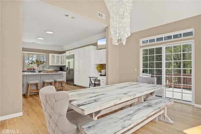 28537 N Shore Rd, Lake Arrowhead, CA 92352 - dining room featuring light wood-style floors, baseboards, and recessed lighting