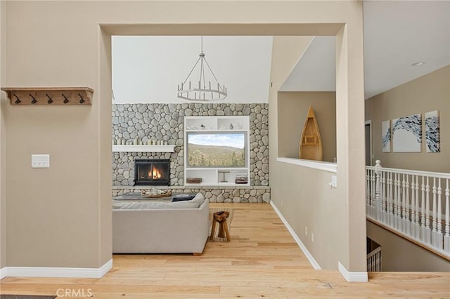 28537 N Shore Rd, Lake Arrowhead, CA 92352 - living room with wood finished floors and a fireplace