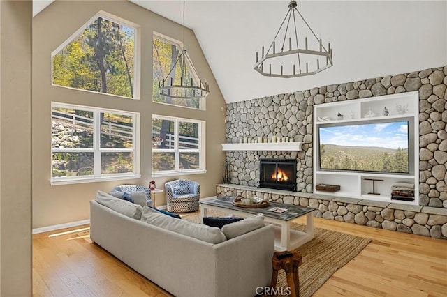 28537 N Shore Rd, Lake Arrowhead, CA 92352 - living room with wood finished floors, high vaulted ceiling, and a fireplace