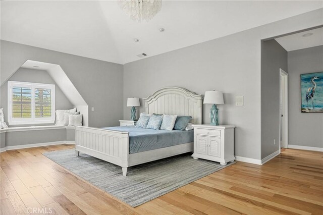 28537 N Shore Rd, Lake Arrowhead, CA 92352 - bedroom featuring vaulted ceiling and light wood finished floors