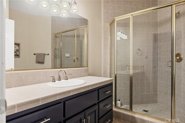 28537 N Shore Rd, Lake Arrowhead, CA 92352 - bathroom featuring vanity and a stall shower