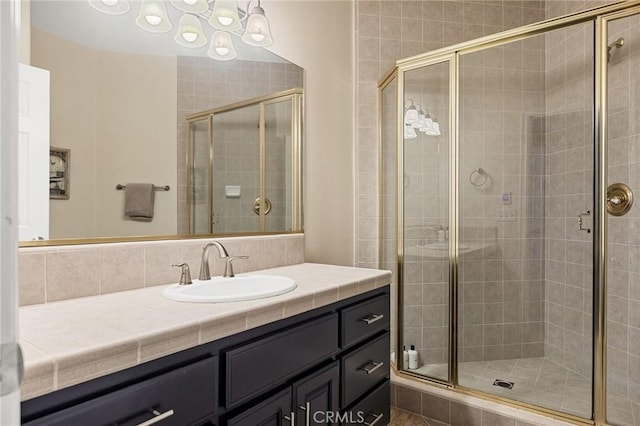 28537 N Shore Rd, Lake Arrowhead, CA 92352 - bathroom featuring vanity and a stall shower