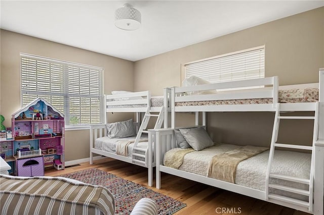 28537 N Shore Rd, Lake Arrowhead, CA 92352 - bedroom featuring wood finished floors and baseboards