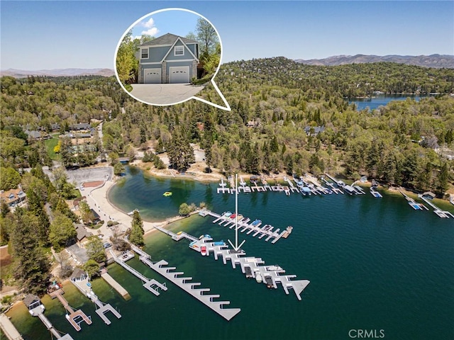 28537 N Shore Rd, Lake Arrowhead, CA 92352 - drone / aerial view of a heavily wooded area and a water and mountain view