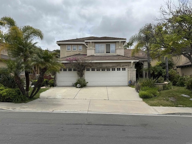 11610 Wills Creek Rd, San Diego, CA 92131 - traditional-style home with stucco siding, a garage, driveway, and a tile roof