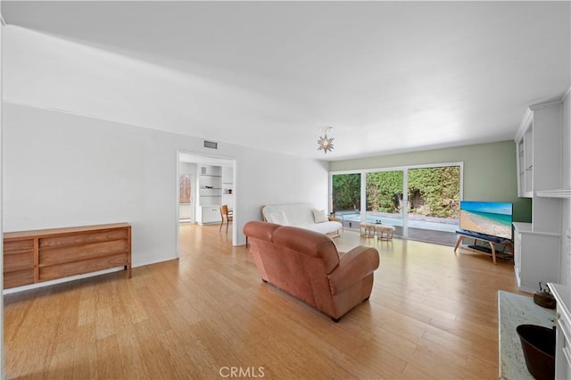 16851 Morse Cir, Huntington Beach, CA 92649 - living room featuring light wood-style floors