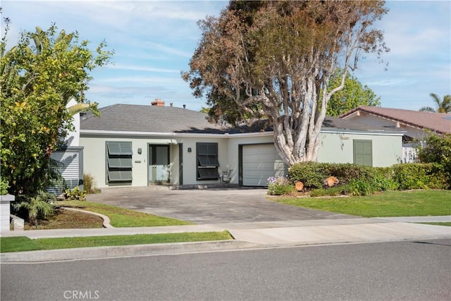 16851 Morse Cir, Huntington Beach, CA 92649 - single story home with stucco siding, a garage, and driveway