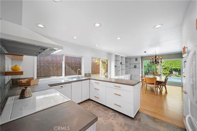 16851 Morse Cir, Huntington Beach, CA 92649 - kitchen with a sink, open shelves, healthy amount of natural light, recessed lighting, and white cabinets