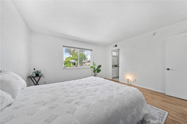 19508 Springport Dr, Rowland Heights, CA 91748 - bedroom with wood finished floors and baseboards