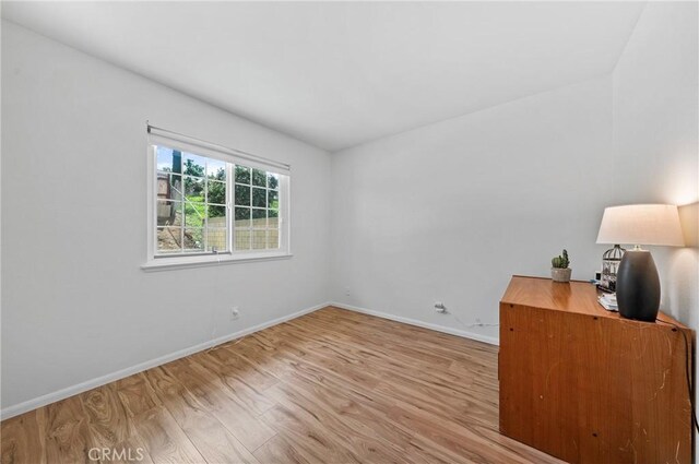 19508 Springport Dr, Rowland Heights, CA 91748 - unfurnished room featuring wood finished floors, baseboards, and an office area