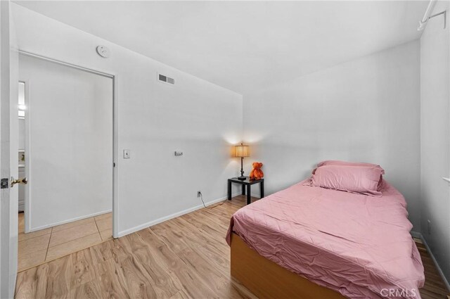 19508 Springport Dr, Rowland Heights, CA 91748 - bedroom featuring wood finished floors and baseboards