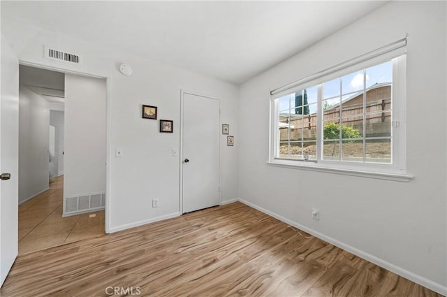 19508 Springport Dr, Rowland Heights, CA 91748 - spare room featuring wood finished floors, baseboards, and a smoke detector