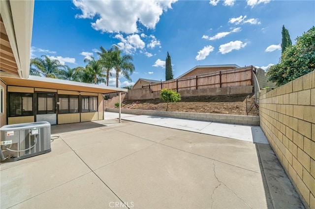 19508 Springport Dr, Rowland Heights, CA 91748 - fenced backyard featuring central AC, a patio, and a sunroom