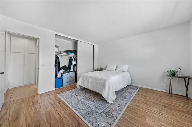 19508 Springport Dr, Rowland Heights, CA 91748 - bedroom featuring a closet, wood finished floors, and baseboards