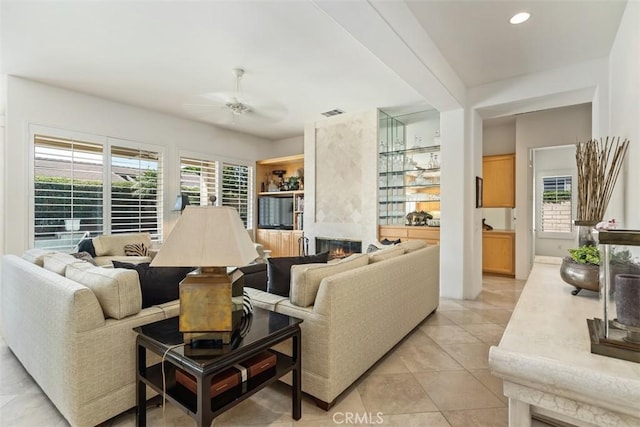 75929 Camino Cielo, Indian Wells, CA 92210 - living area with ceiling fan, light tile patterned floors, a fireplace, and recessed lighting