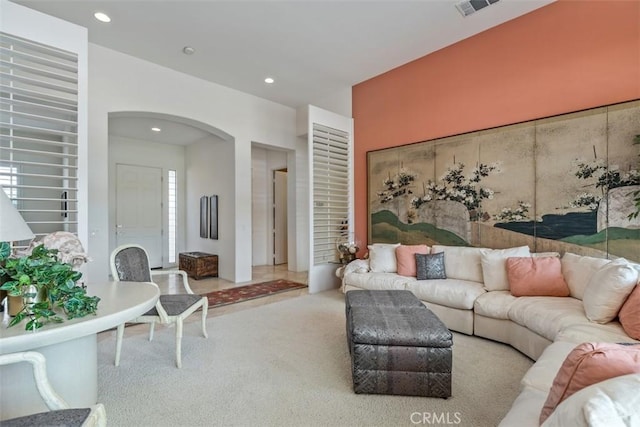 75929 Camino Cielo, Indian Wells, CA 92210 - living room with carpet floors, arched walkways, and recessed lighting