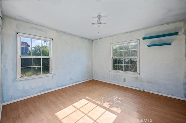 1506 W 5th St, San Pedro, CA 90732 - spare room with wood finished floors, baseboards, and a ceiling fan