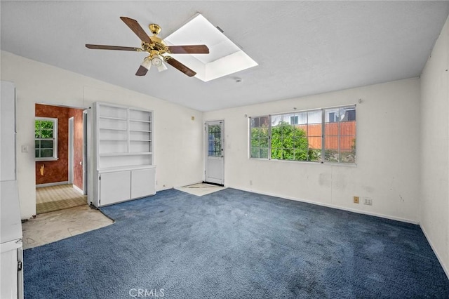 1506 W 5th St, San Pedro, CA 90732 - unfurnished room with a skylight, healthy amount of natural light, carpet floors, and ceiling fan