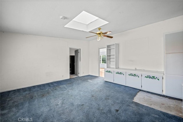 1506 W 5th St, San Pedro, CA 90732 - empty room featuring a skylight, carpet, ceiling fan, and a smoke detector