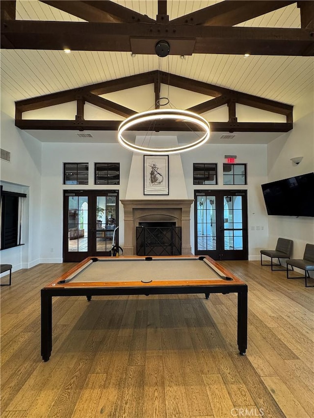 13529 Scarlet Sage Trl, San Diego, CA 92130 - recreation room with french doors, baseboards, a fireplace, wood finished floors, and wood ceiling