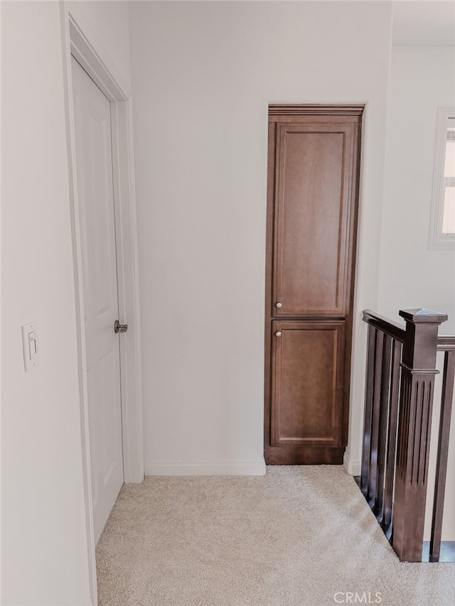 13529 Scarlet Sage Trl, San Diego, CA 92130 - hall with carpet flooring and baseboards