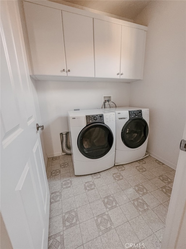13529 Scarlet Sage Trl, San Diego, CA 92130 - laundry room featuring cabinet space, light flooring, separate washer and dryer, and baseboards