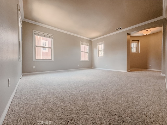 13529 Scarlet Sage Trl, San Diego, CA 92130 - spare room featuring crown molding, light carpet, and baseboards