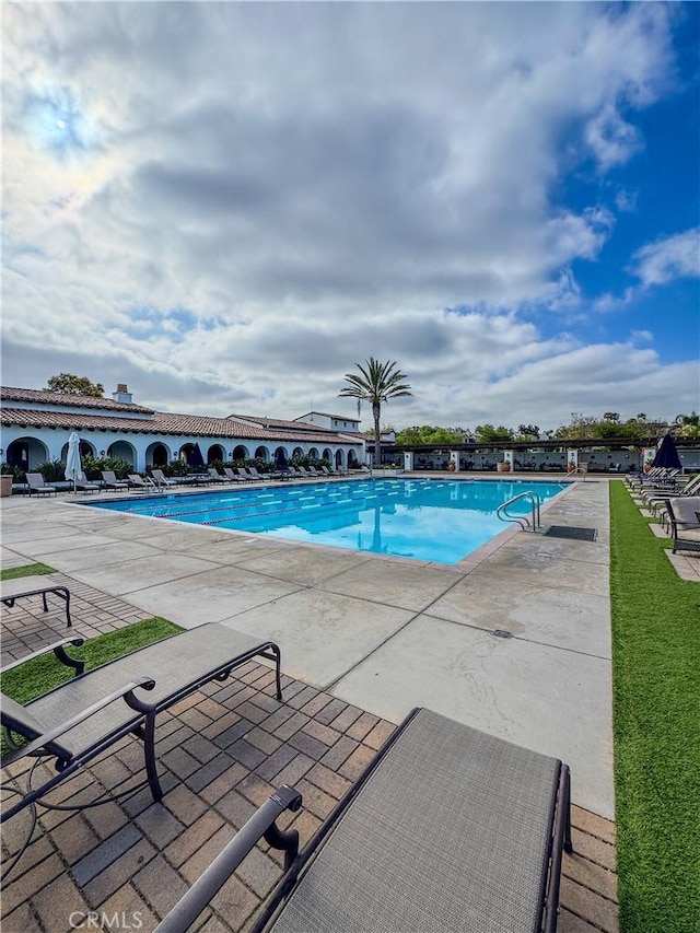 13529 Scarlet Sage Trl, San Diego, CA 92130 - community pool featuring a patio area