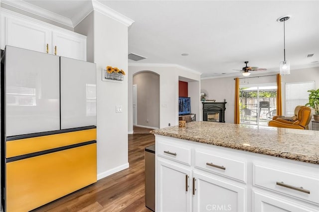 3008 La Vina Cir, Los Banos, CA 93635 - kitchen featuring freestanding refrigerator, ornamental molding, a ceiling fan, light wood-style floors, and arched walkways