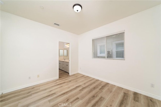 8063 Cambria Cir, Stanton, CA 90680 - empty room featuring light wood-style floors and baseboards