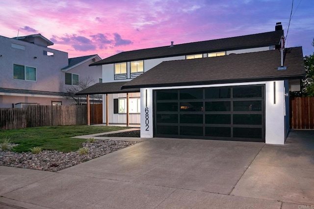 6802 Maury Dr, San Diego, CA 92119 - view of front of home with driveway, stucco siding, an attached garage, and a shingled roof