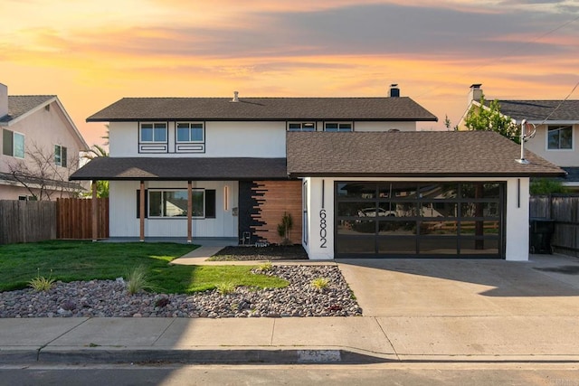 6802 Maury Dr, San Diego, CA 92119 - view of front of home featuring an attached garage, concrete driveway, and roof with shingles