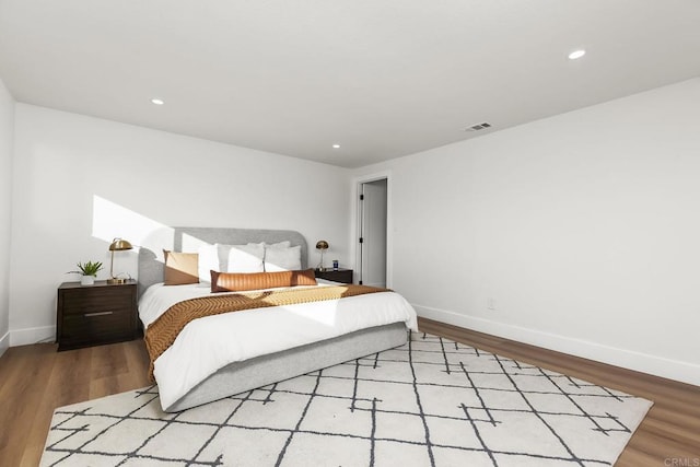 6802 Maury Dr, San Diego, CA 92119 - bedroom featuring baseboards, wood finished floors, and recessed lighting